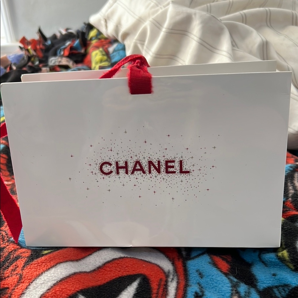 CHANEL Red and White Clutch Elegant Design